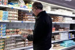 Inflation fell last month as gas prices dropped sharply, a sign prices cooling before tariffs